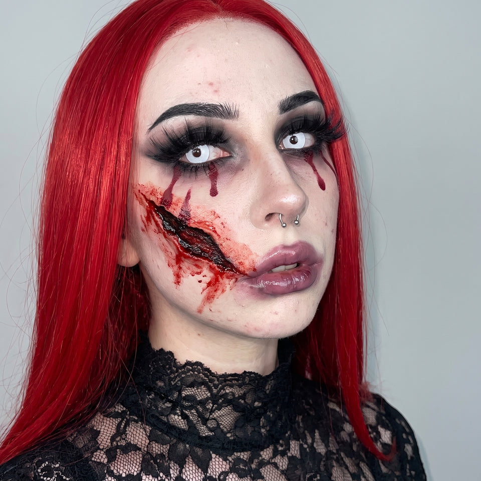 Bloody Cheek Slash Wound