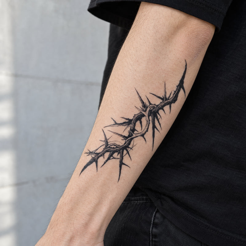 Thorn Halo realistic temporary tattoo wrapped around a forearm