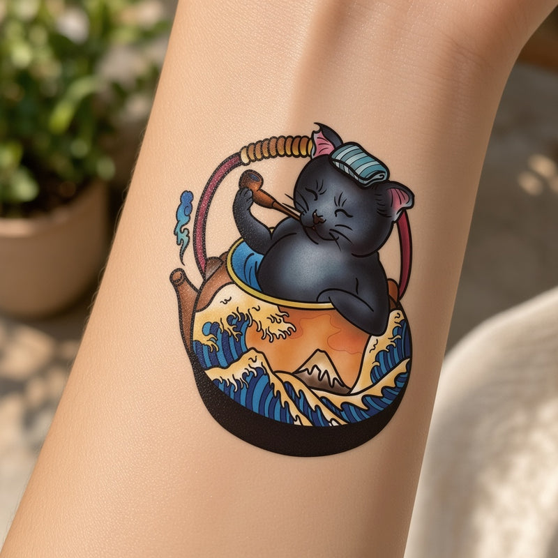Cat in a wave teapot temporary tattoo worn on the forearm