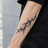 Thorn Halo realistic temporary tattoo wrapped around a forearm