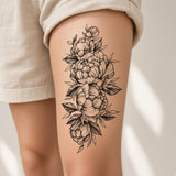 Bloom Theory Classic Flower temporary tattoo worn on the outer thigh