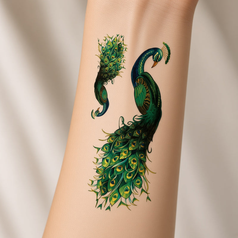 Crimson Drift Peacock temporary tattoo worn on the inner forearm