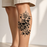 Cinder Ritual Skull & Flower temporary tattoo worn on the outer calf